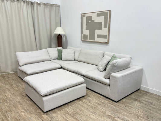 Pre-owned Ashley Modular Cloud Sectional with Ottoman